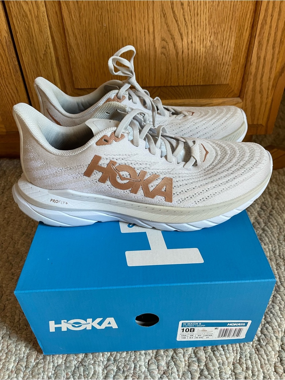 Hoka Mach 5 Women's Running Sneakers in White with Gold Logo